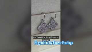 Elegantes brincos de flor da sorte em prata 925 pêssego rosa CZ
