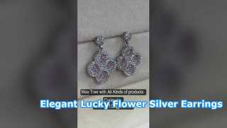 Brincos elegantes em prata 925 com flor da sorte CZ rosa